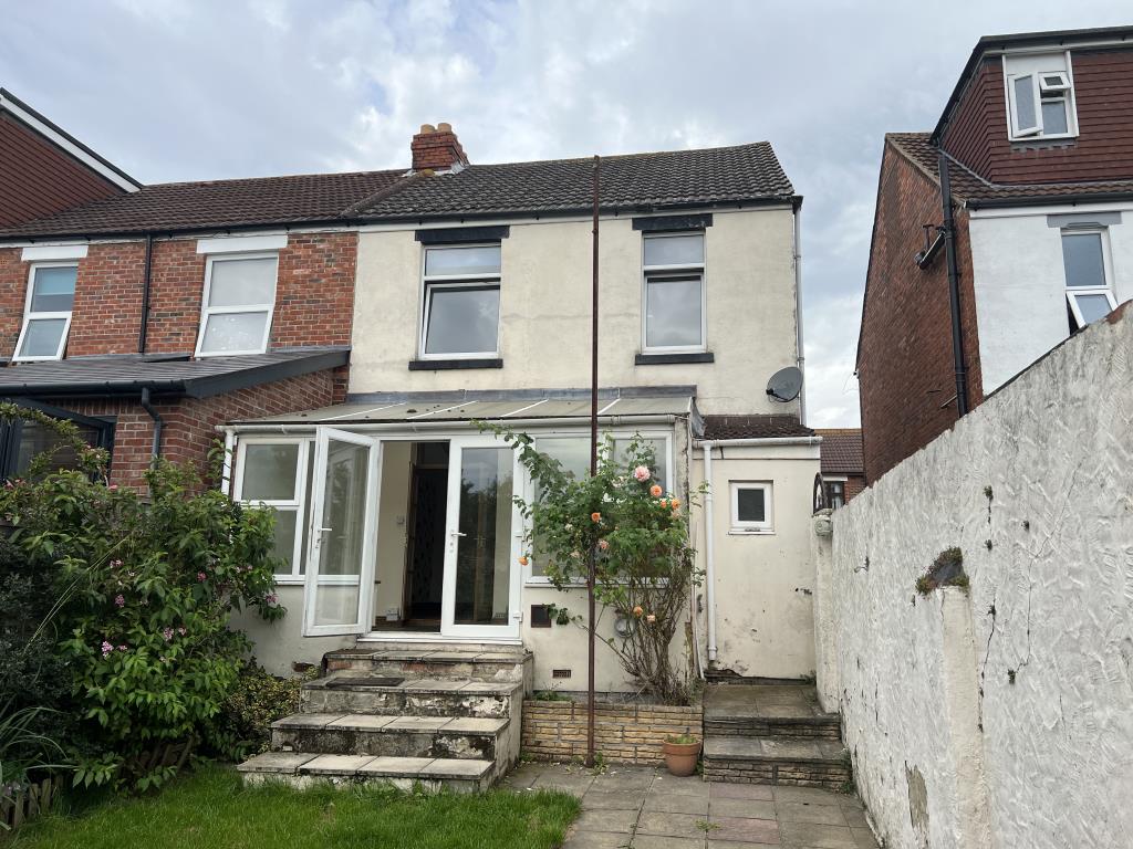 Lot: 78 - END-TERRACE THREE-BEDROOM HOUSE - Rear elevation from rear garden